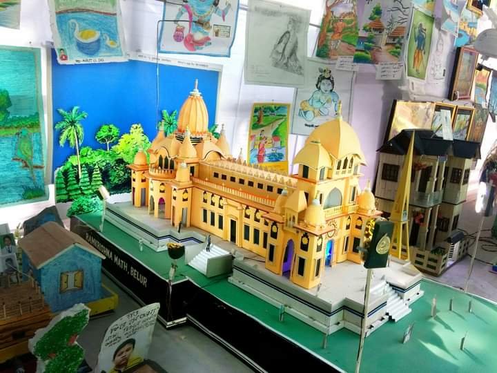 Three people are standing